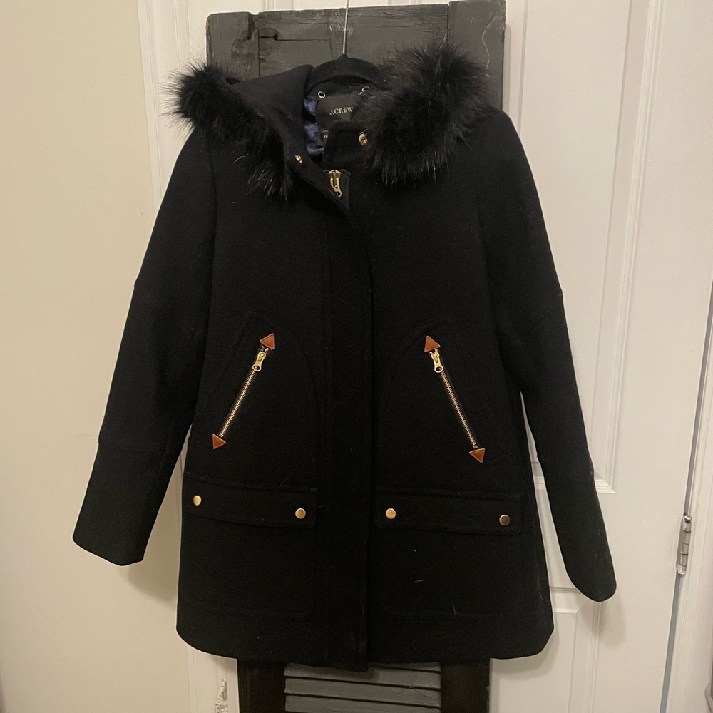 J Crew Stadium Peacoat.  Black in color, midnight blue silk lining